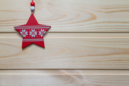 Beautiful Christmas wooden background decorated with a toy.の写真素材