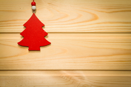 Beautiful Christmas wooden background decorated with a toy.の写真素材