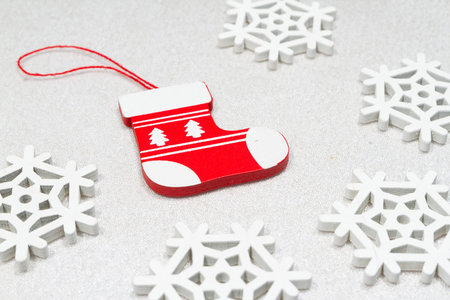 Christmas wooden ornaments toy stocking with ribbon .