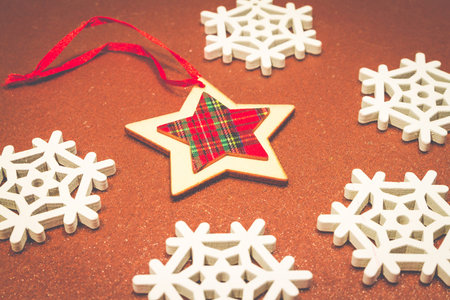 Christmas wooden ornaments toy star with ribbon .の写真素材