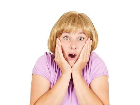 Close-up portrait of a young frightened, scared women. She opened her mouth in surprise. の写真素材