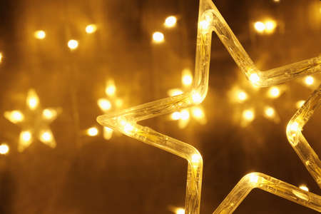 Glowing garland of stars. Christmas and New Year. Festive Decorations for Christmas and New Year.の写真素材