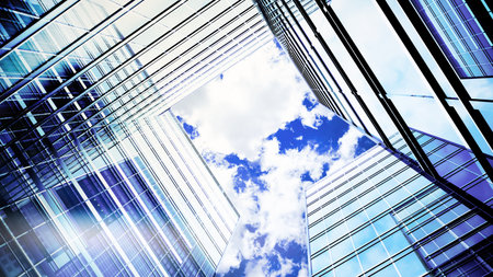 Glass building Architecture technology industry success business concept. Transparent glass wall of office building. Modern office building with glass facade on a clear sky background. 3d Renderingの写真素材