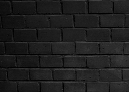 Abstract dark brick wall texture background, black brick wall surface texture.の写真素材
