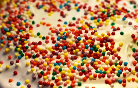 Confectionery multicolored sprinkles on a traditional Easter cakeの写真素材