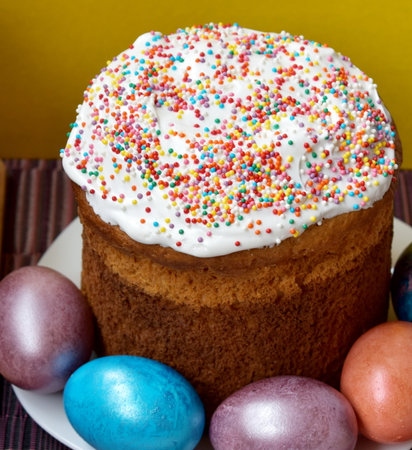 Traditional Easter cake and painted eggsの写真素材