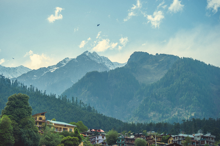 In the front Manali city on background Himalayan mountans and blue sky with cloudsの写真素材