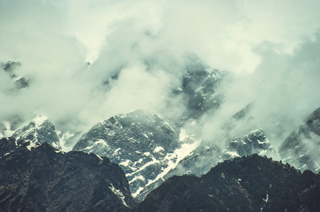 The top of one of the Himalayan mountains in the clouds.の写真素材