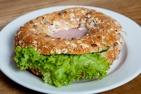 Bagel with hamBagel with ham on a plateの写真素材