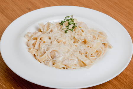 Pasta Tagliatelle with mushrooms and chickenの写真素材