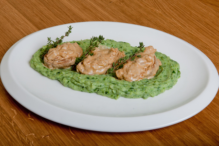 Pork medallions in a creamy mushroom sauceの写真素材