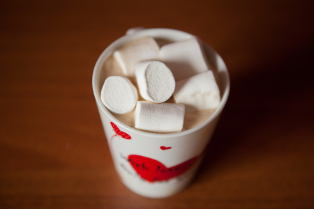 Hot chocolate with white marshmallows in hearts and teddy bears on Valentines Dayの写真素材