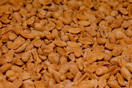 A background of delicious salty peanuts, a texture of peanutsの写真素材