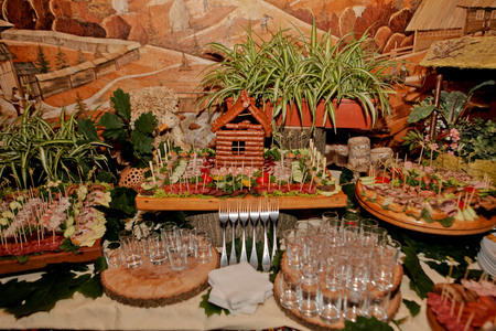 Exquisite wedding table with snacks, Cossack table.の写真素材