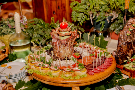Exquisite wedding table with snacks, Cossack table.の写真素材