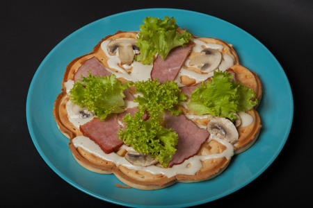 ham wafers for breakfast on a black background.の写真素材