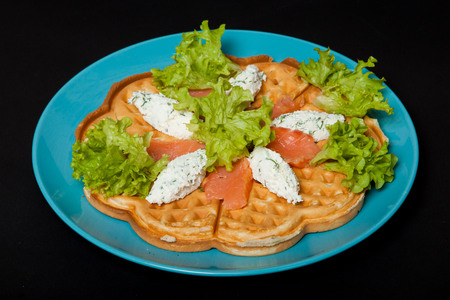 Chop with salmon for breakfast on a black background.の写真素材
