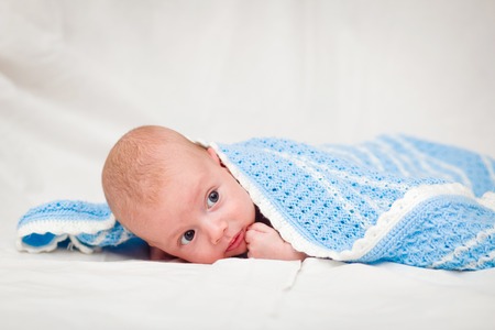 Baby, Two Month Old. Naked two-month-old baby is covered with a blue veilの写真素材