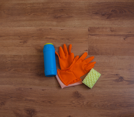 Cleaning tools on a parquet floor. Cleaning toolsの写真素材
