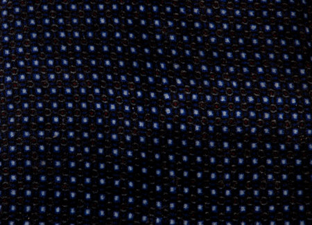 Texture background pattern. Abstract background of a luxurious blue fabric in white polka dots wavy...