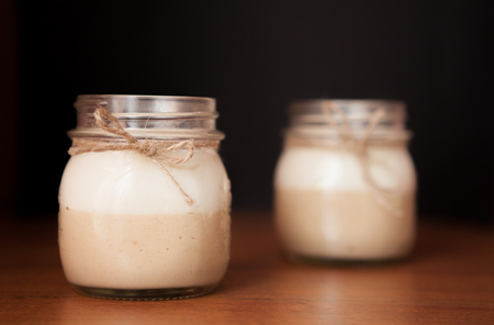 Delicious Dessert in a glass jar on a black background.の写真素材