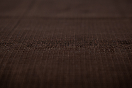 brown fabric texture for background,focus in the centerの写真素材