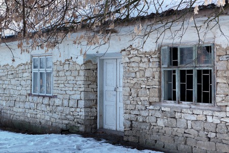 House with in the ancient stone wall white isolated.の写真素材