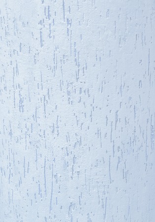 Abstract background of light blue color with a texture of decorative plaster.の写真素材