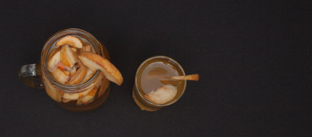 compote of dried fruits with dried fruit on a black background. Top view with copyspace for your text.の写真素材
