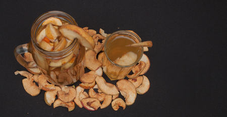 compote of dried fruits with dried fruit on a black background.の写真素材