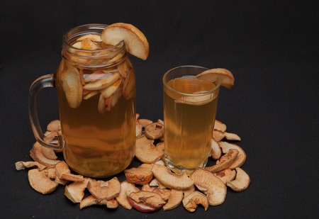 compote of dried fruits with dried fruit on a black background.の写真素材