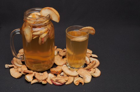 compote of dried fruits with dried fruit on a black background.の写真素材