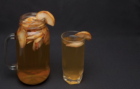compote of dried fruits with dried fruit on a black background.の写真素材
