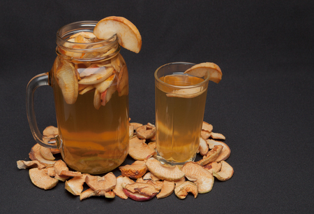 compote of dried fruits with dried fruit on a black background.の写真素材