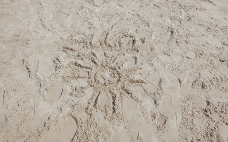 Sun on sand on beach holiday background sign concept.の写真素材