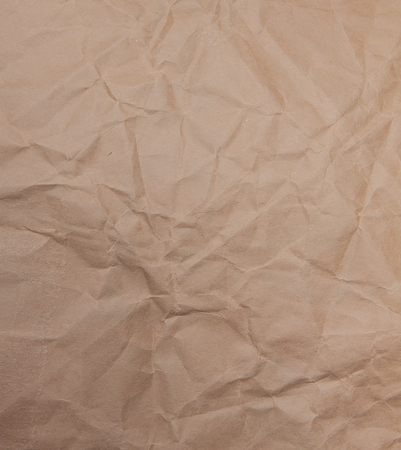 Textured brown of remembered craft paper. Useful as background.の写真素材