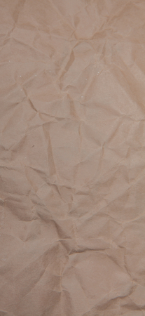 Textured brown of remembered craft paper. Useful as background.の写真素材