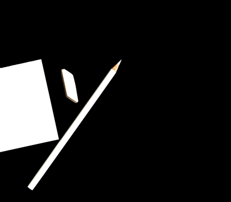 White blank notebook with pencil, eraser and tag paper on black background. Business  concept.の写真素材