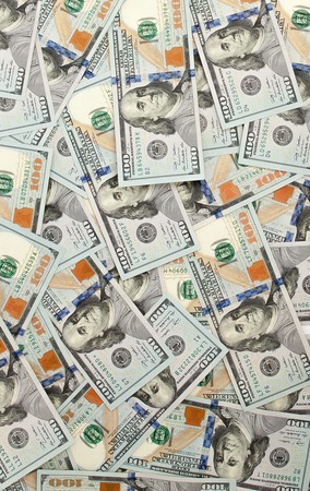 One hundred dollars pile as background, background from dollarsの写真素材
