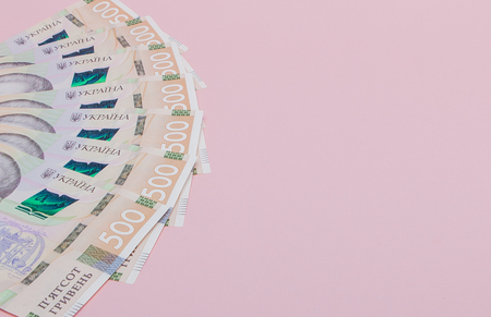 Modern Ukrainian money on pink background - hryvnia . 500 banknotes. UAH. Money concept.の写真素材