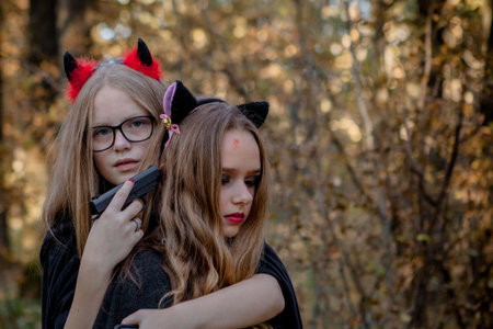 Halloween daemon kills the witch in the woods