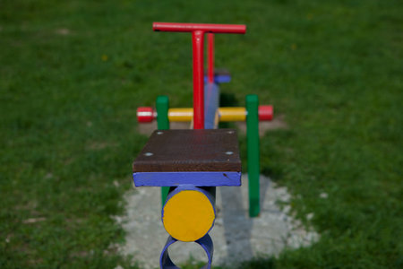 Old boat swing on a playground.