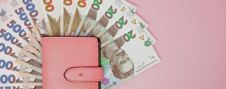 recount money ukrainian hryvnia bills in wallet. Finance crisis in Ukraine, the fall of the hryvnia to the dollar exchange rate.の写真素材