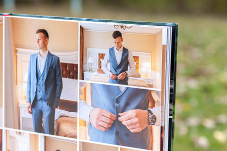 Pages of wedding photobook or wedding album on green background.の写真素材
