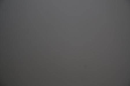 Texture smooth black surface of the metal door to the apartment.の写真素材