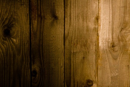 old and aged wooden textured background in brown.の写真素材