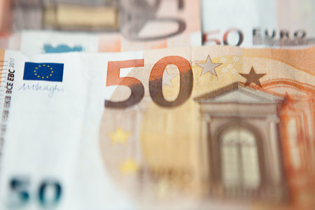 Closeup of a group of fifty euros banknote background.の写真素材