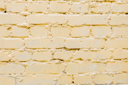 Yellow bricks pattern on wall for abstract background.の写真素材