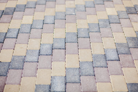 Stone pavement texture. Granite cobblestoned pavement background. Abstract background of old...