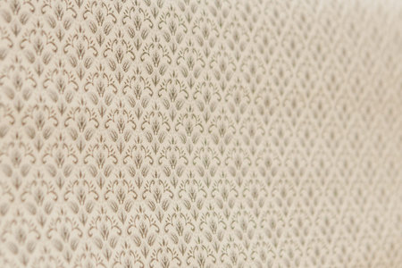 wallpaper texture background in light sepia toned art paper or wallpaper texture for background in...